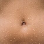 Spiritual Mysteries Behind Belly Button Itching